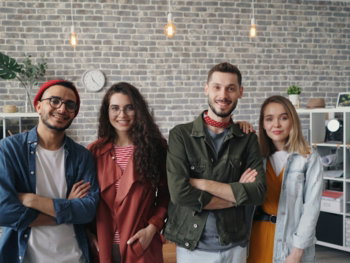 a group of people standing next to each other